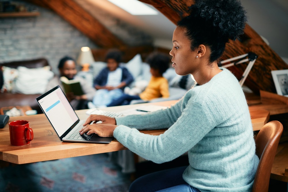20230420-090356african-american-woman-working-on-laptop-while-bei-2022-11-23-18-01-07-utc